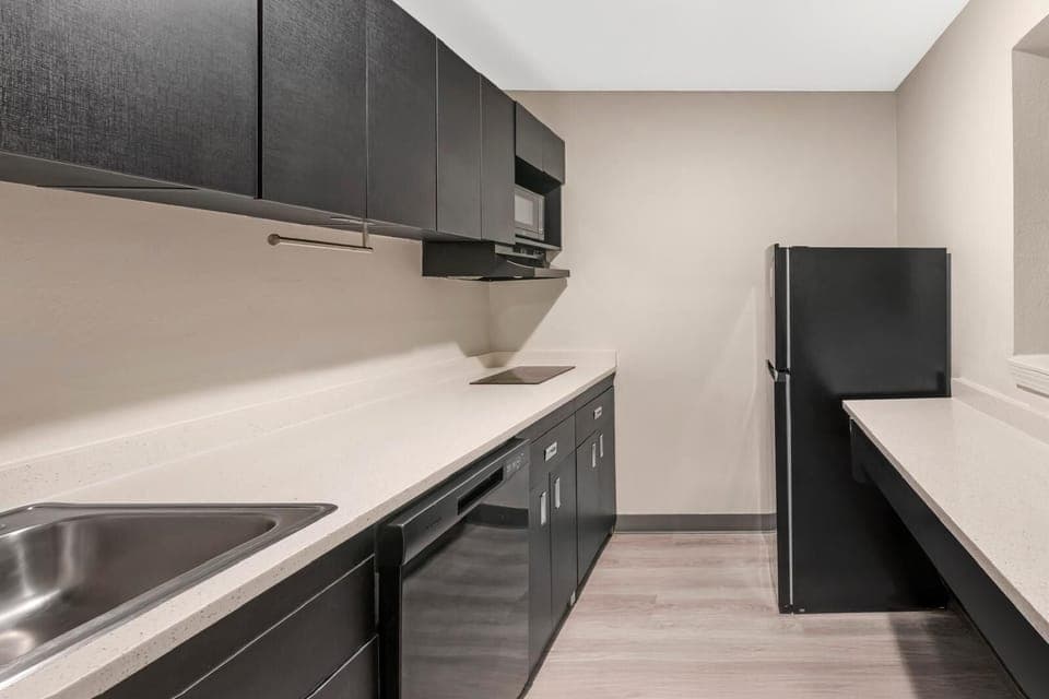 Suite, 1 Queen Bed, Non Smoking (Efficiency) | Private kitchen | Full-size fridge, microwave, oven, stovetop