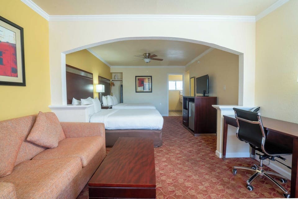 Suite, 2 Queen Beds, Non Smoking | In-room safe, desk, blackout drapes, iron/ironing board
