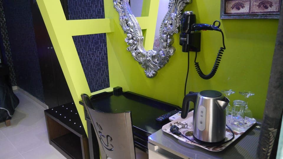 32-inch flat-screen TV with satellite channels, TV