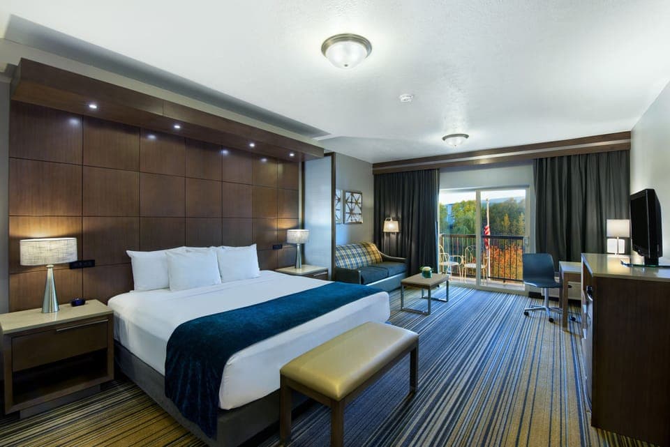 Riverview Balcony King Suite Sleeper Sofa | Premium bedding, desk, laptop workspace, blackout drapes