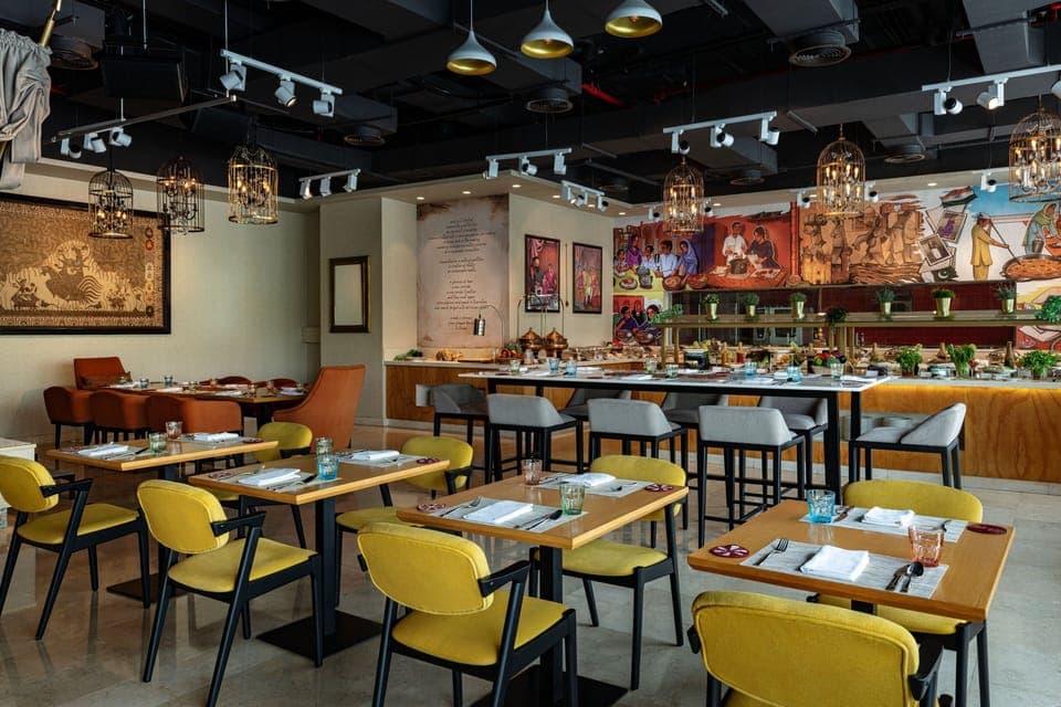 2 restaurants, breakfast, lunch, dinner served; Indian cuisine