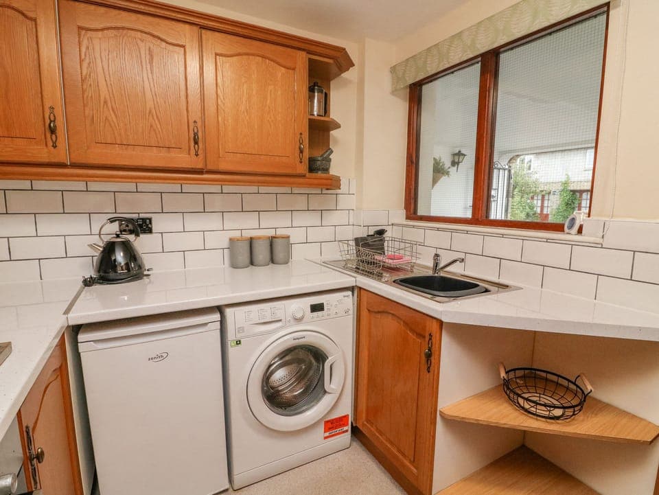 Fridge, electric kettle, toaster, cookware/dishes/utensils