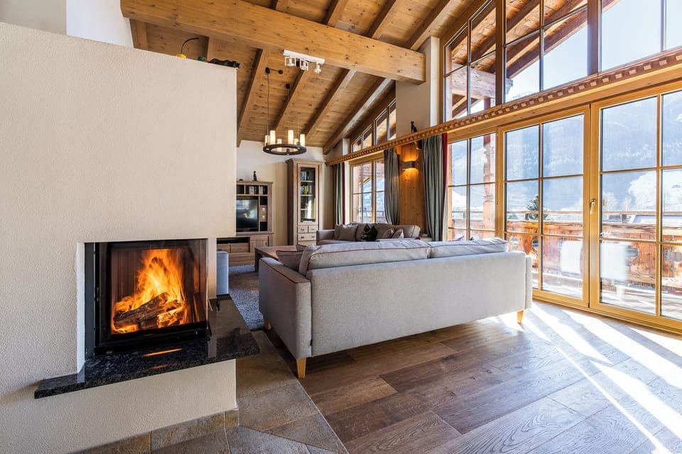 Eight-Bedroom Chalet | Living area | Heated floors