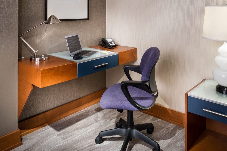 Premium bedding, down comforters, pillowtop beds, in-room safe