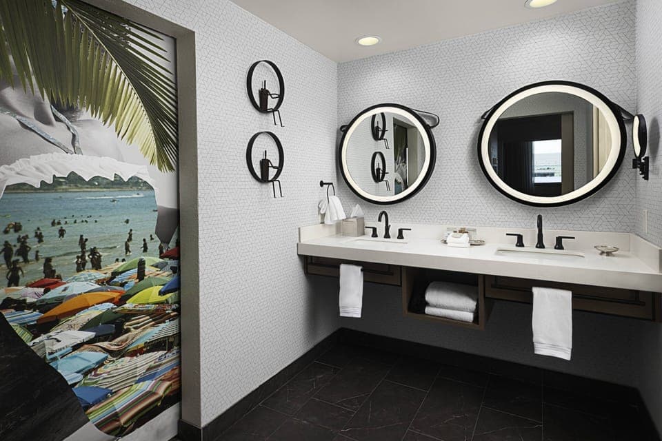 Hypo-allergenic bedding, down comforters, pillowtop beds, in-room safe