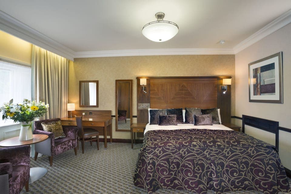 Standard Double Room | Desk, laptop workspace, blackout drapes, iron/ironing board