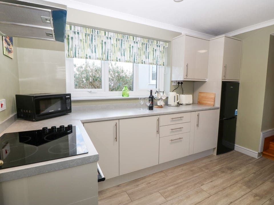 Fridge, electric kettle, toaster, cookware/dishes/utensils