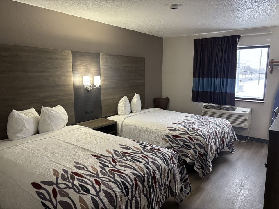 Desk, laptop workspace, blackout drapes, iron/ironing board