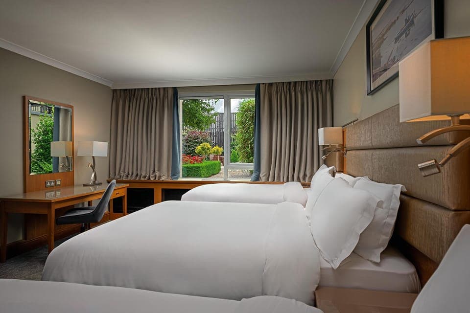 Family Room, Garden View | Premium bedding, minibar, in-room safe, desk