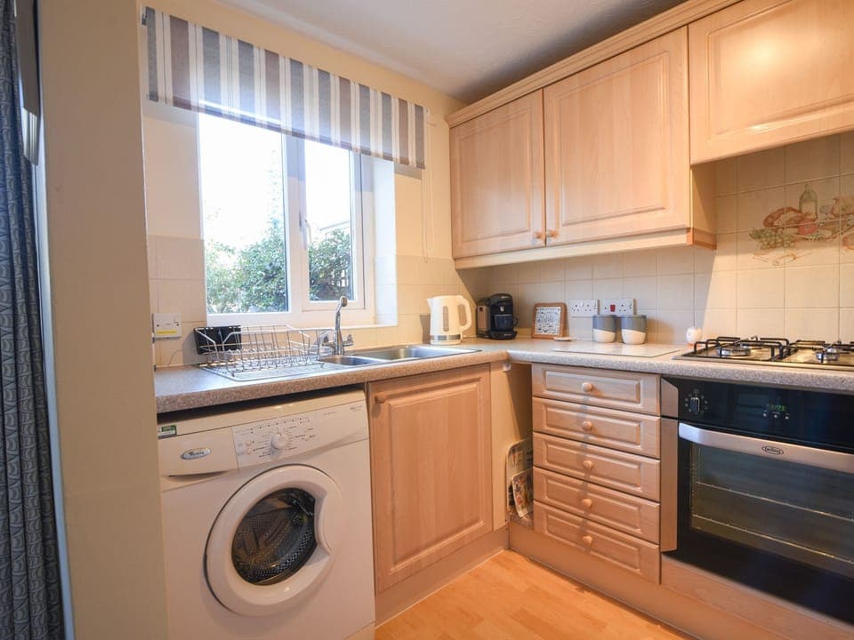 Fridge, electric kettle, toaster, cookware/dishes/utensils