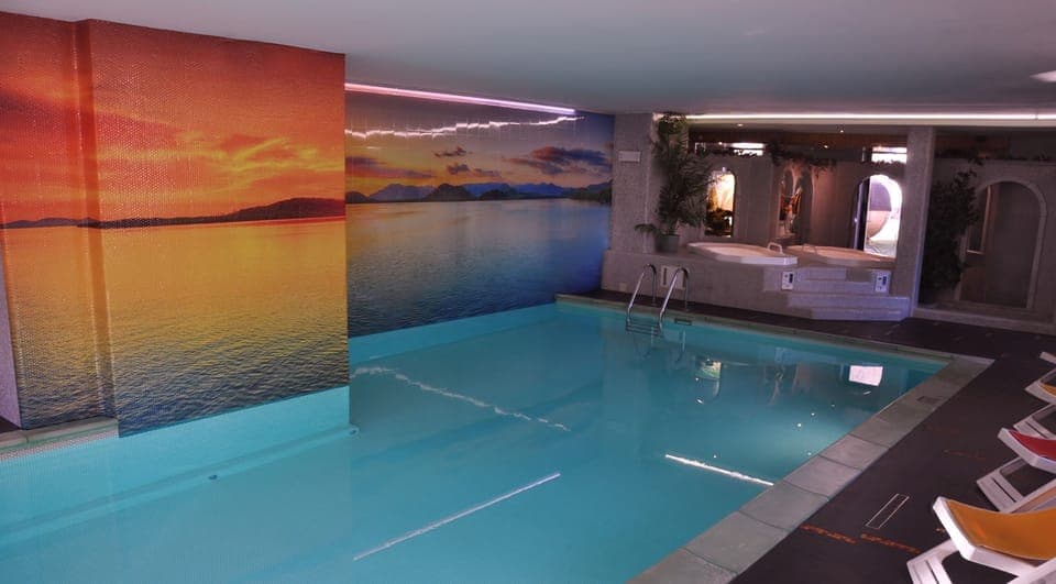 Indoor pool, seasonal outdoor pool, sun loungers