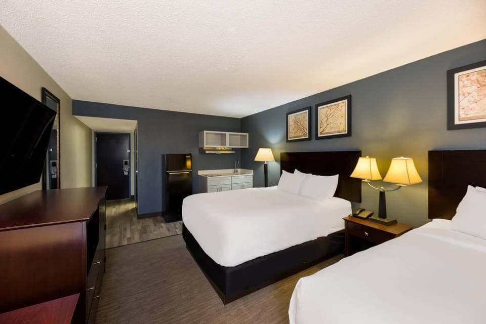 Room, 2 Queen Beds, Non Smoking (Efficiency) | Free WiFi, bed sheets