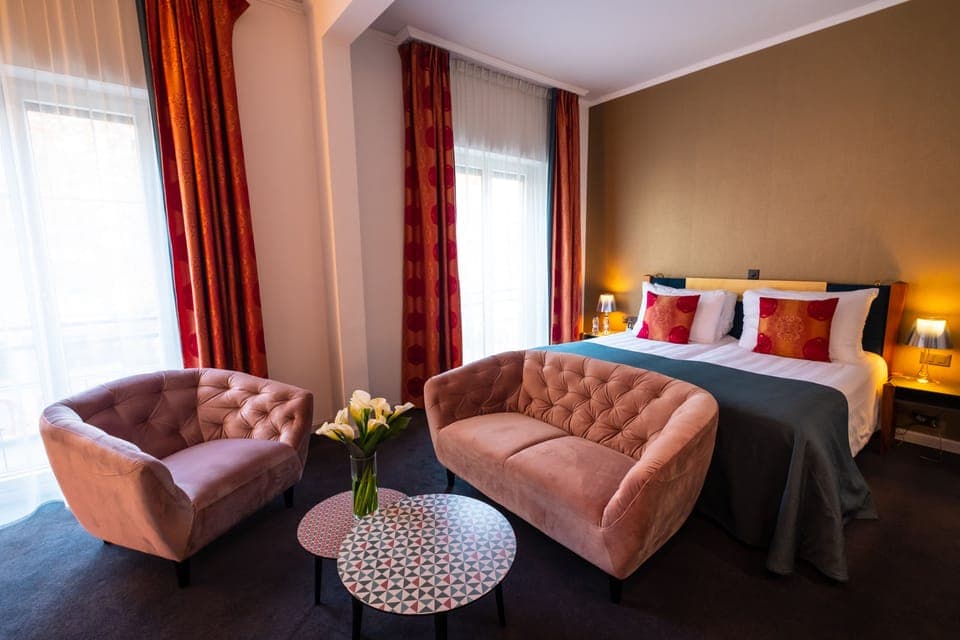 Deluxe Double Room | Minibar, in-room safe, individually decorated, individually furnished