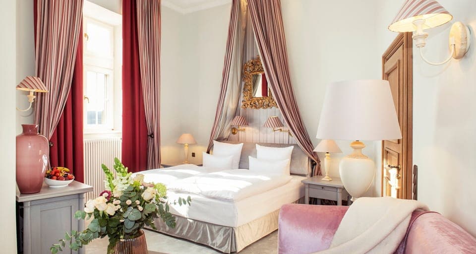 Hypo-allergenic bedding, down comforters, minibar, in-room safe