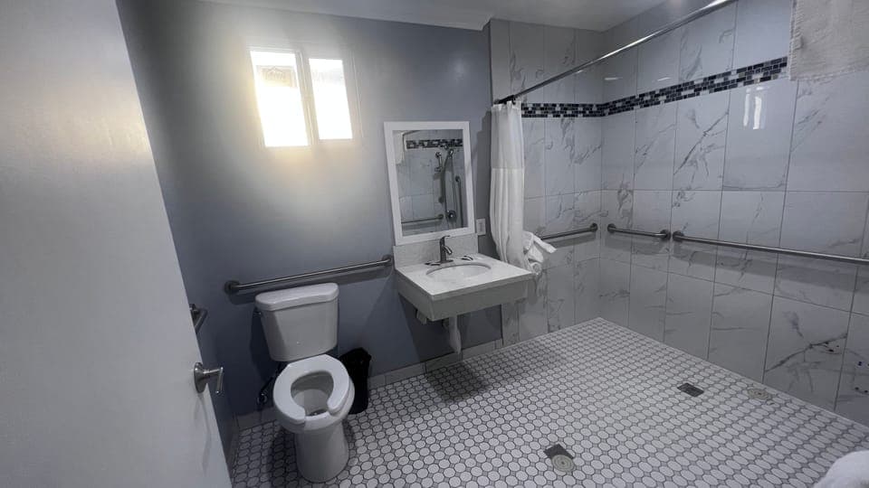 Standard Room, Accessible | Bathroom | Shower, rainfall showerhead, towels, soap