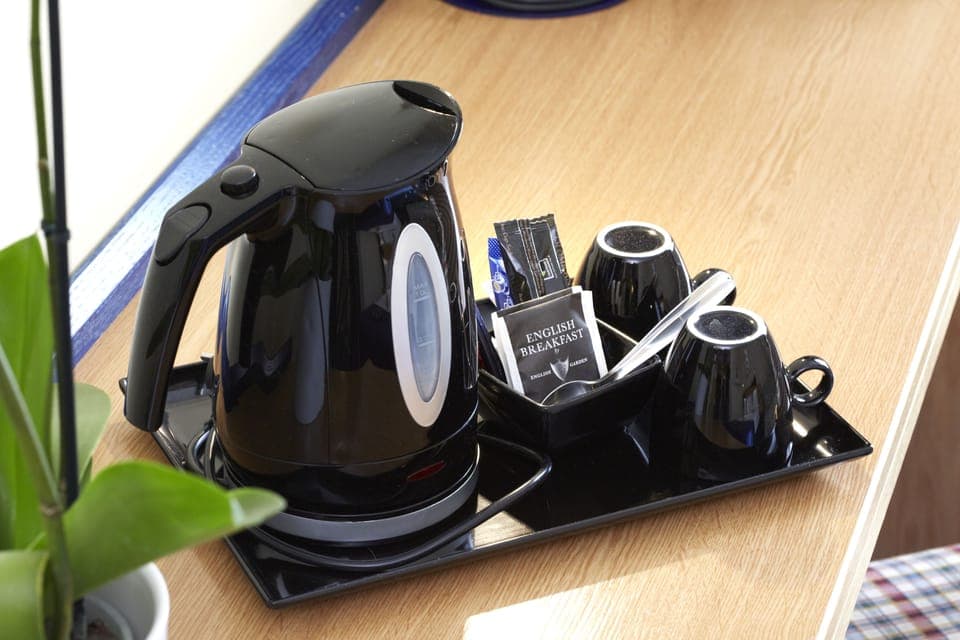 Desk, soundproofing, iron/ironing board, free cribs/infant beds