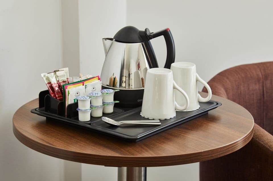 Hypo-allergenic bedding, desk, laptop workspace, iron/ironing board