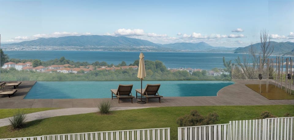 Seasonal outdoor pool, open 9:00 AM to 8:00 PM, pool umbrellas