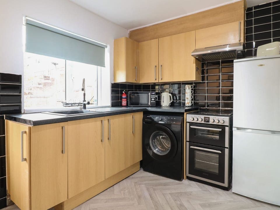 Fridge, electric kettle, toaster, cookware/dishes/utensils