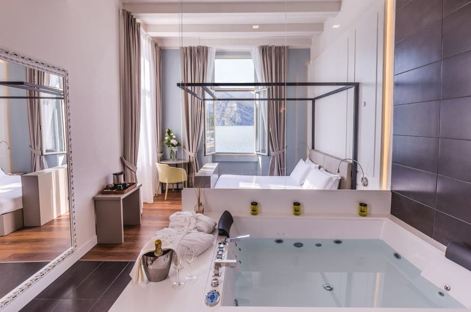 Junior Suite, Hot Tub, Lake View | Jetted tub