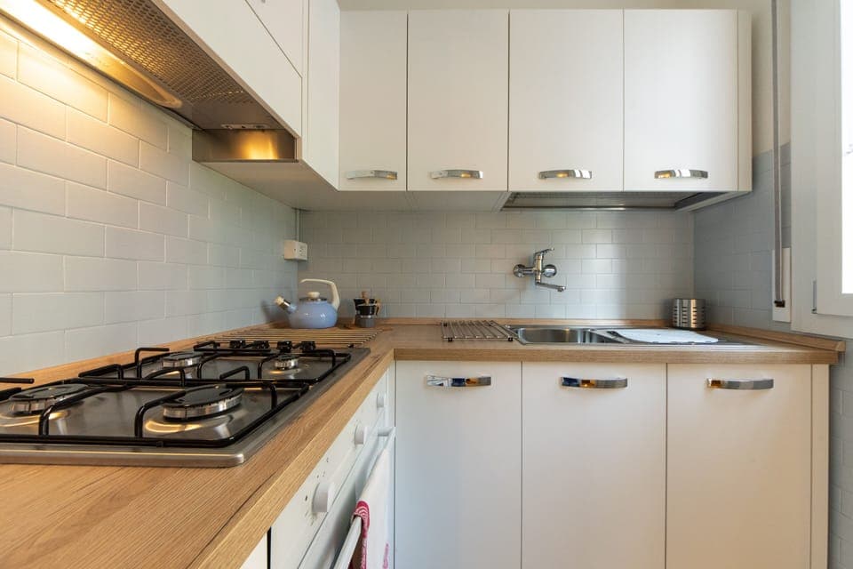 Apartment | Private kitchen | Full-size fridge, oven, stovetop, cookware/dishes/utensils