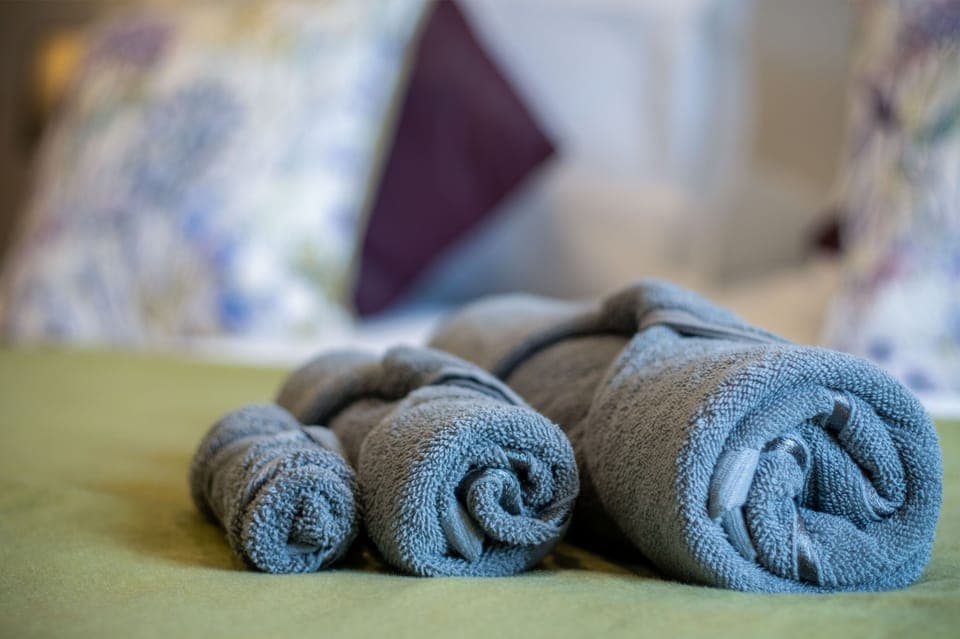 4 bedrooms, premium bedding, iron/ironing board, bed sheets