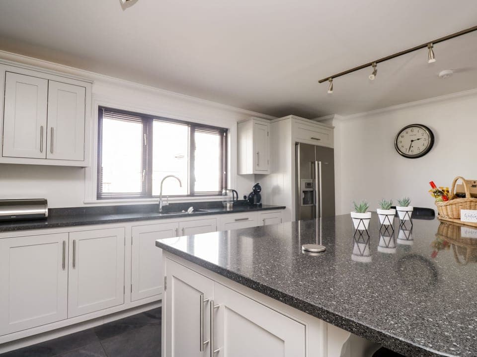 Fridge, electric kettle, toaster, cookware/dishes/utensils