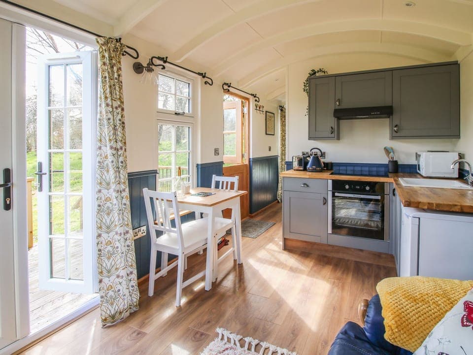 Fridge, electric kettle, toaster, cookware/dishes/utensils