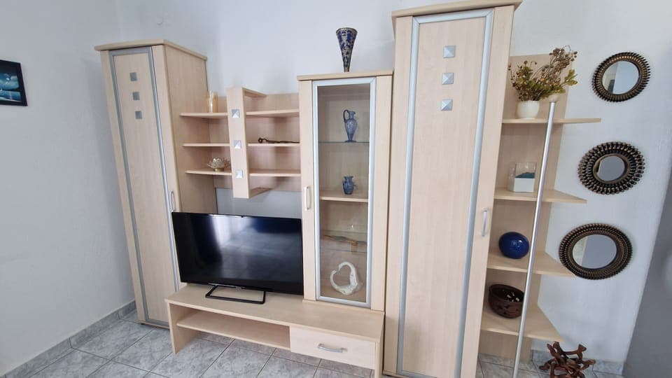 Premium Apartment | Living area | 140-cm Smart TV with cable channels, TV