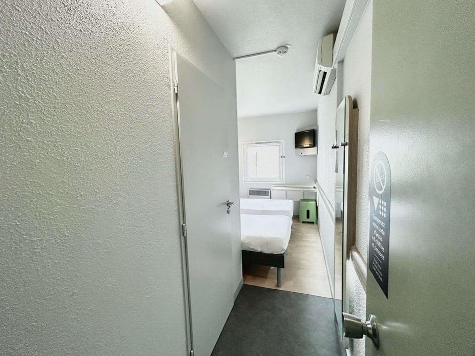 Desk, laptop workspace, blackout drapes, soundproofing