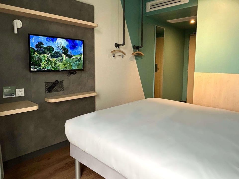 Desk, laptop workspace, blackout drapes, soundproofing