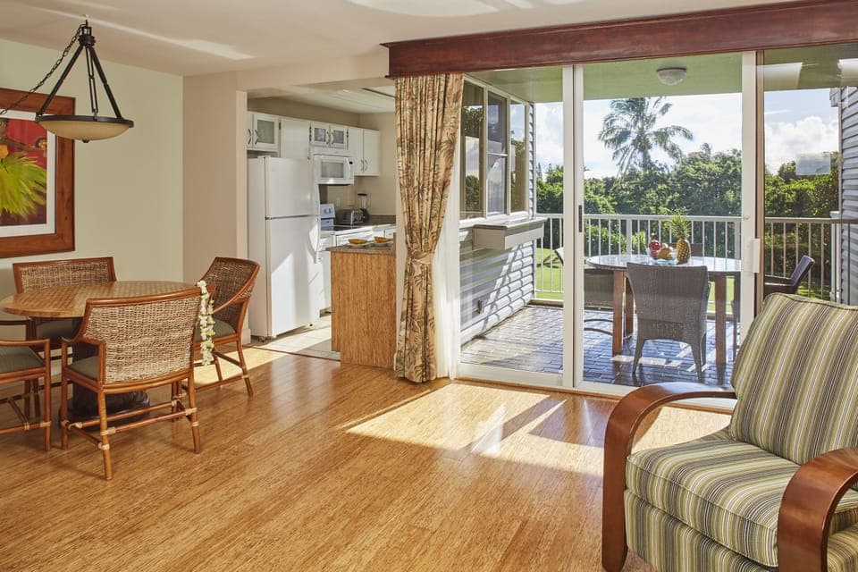 Premium Condo, 1 Bedroom, Kitchen, Garden View | Living area | TV, DVD player, iPod dock