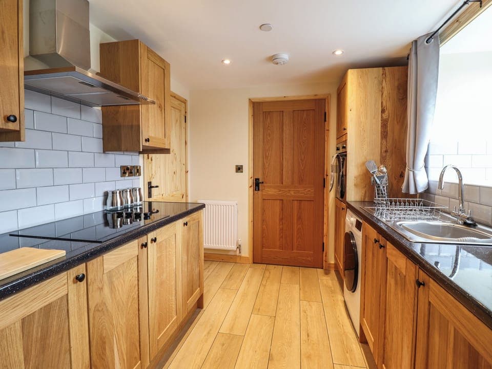 Fridge, electric kettle, toaster, cookware/dishes/utensils