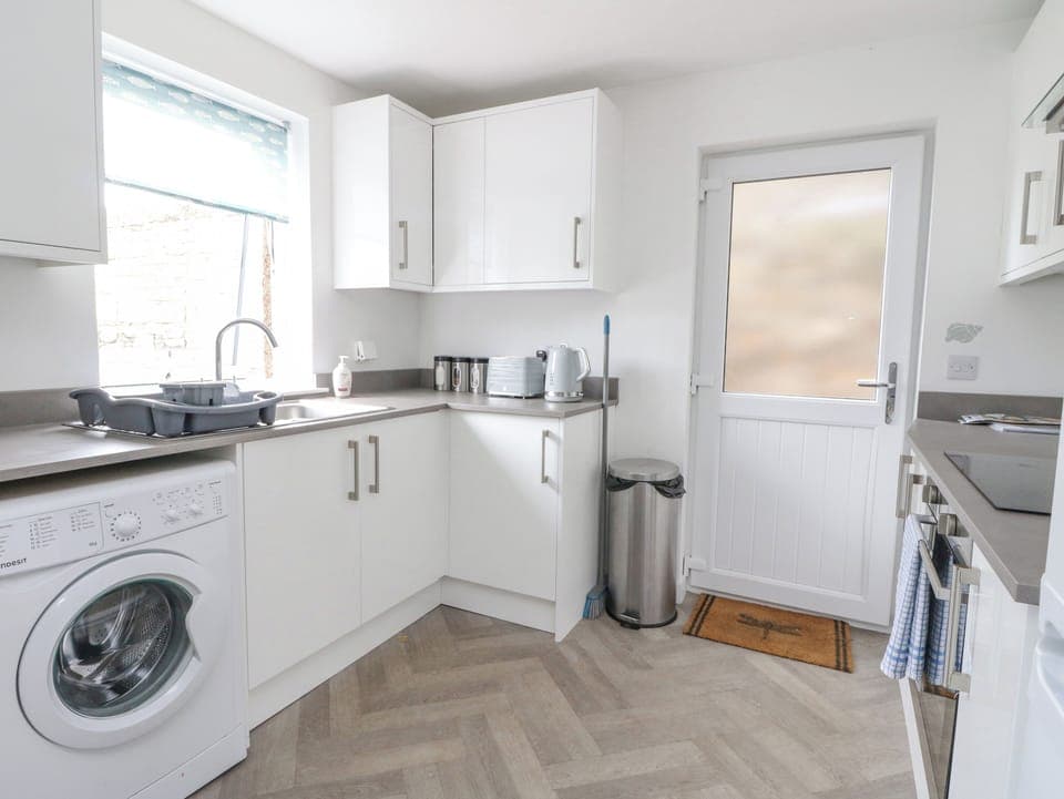 Fridge, electric kettle, toaster, cookware/dishes/utensils