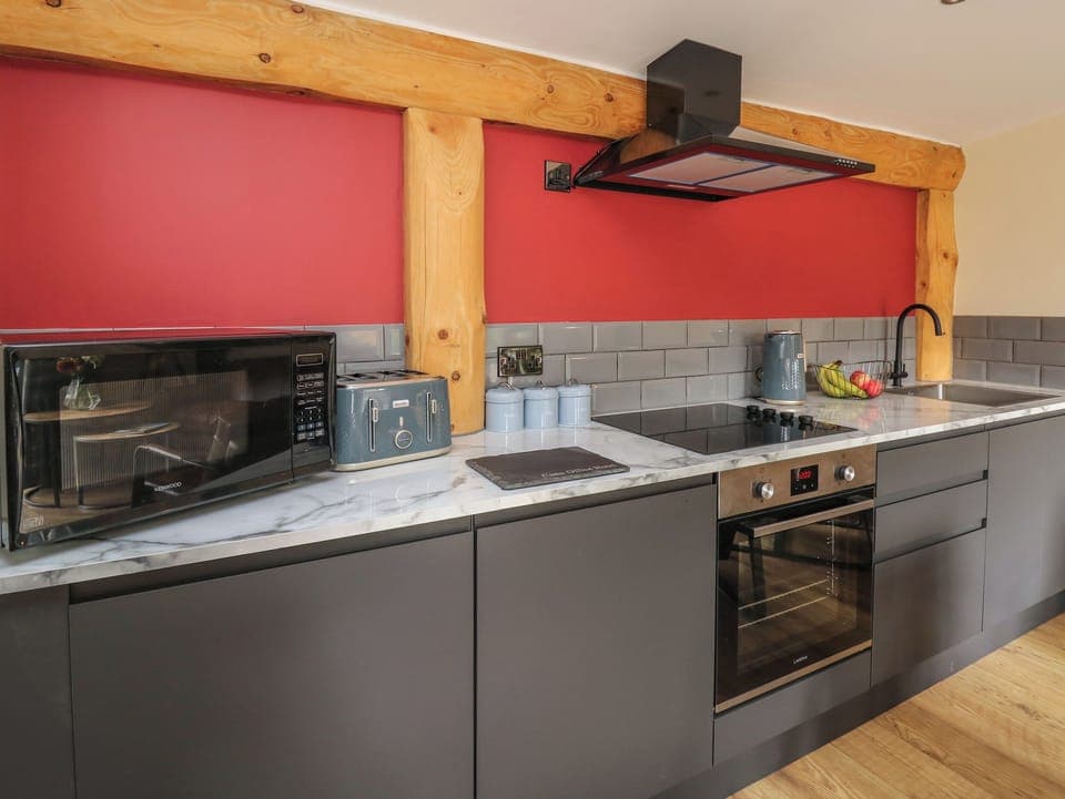 Fridge, electric kettle, toaster, cookware/dishes/utensils