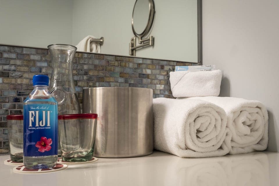 Family Room, 1 King Bed and 2 Twin Beds, River View (Room 05) | Bathroom | Shower, hair dryer, bathrobes, towels