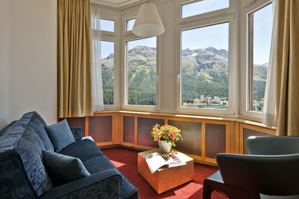 Junior Suite, Lake View | Living area | Flat-screen TV, MP3 dock