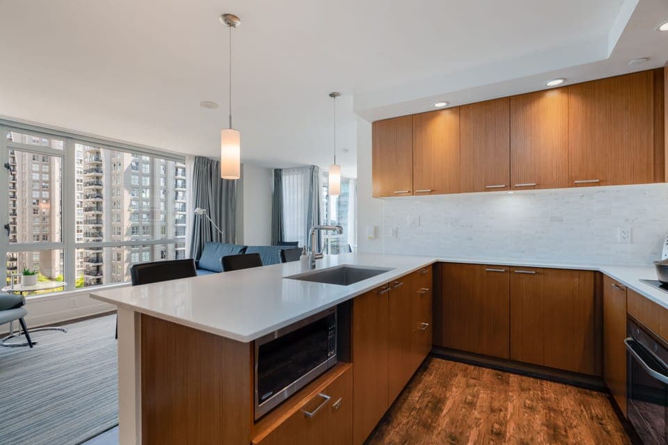 Suite, Multiple Beds | Private kitchen | Fridge, microwave, oven, stovetop