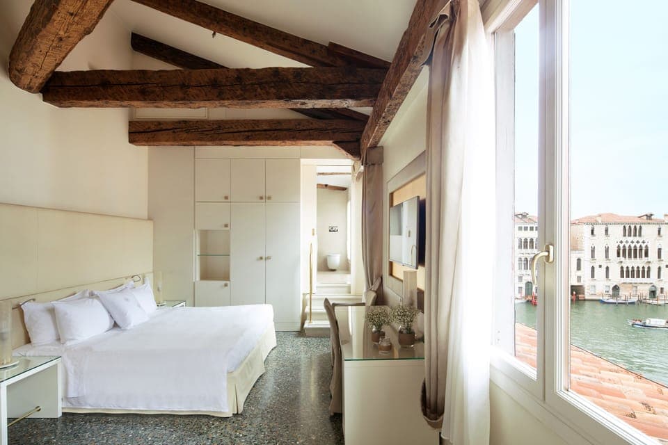 Premium Room (Partial Canal View) | Down comforters, minibar, in-room safe, free WiFi