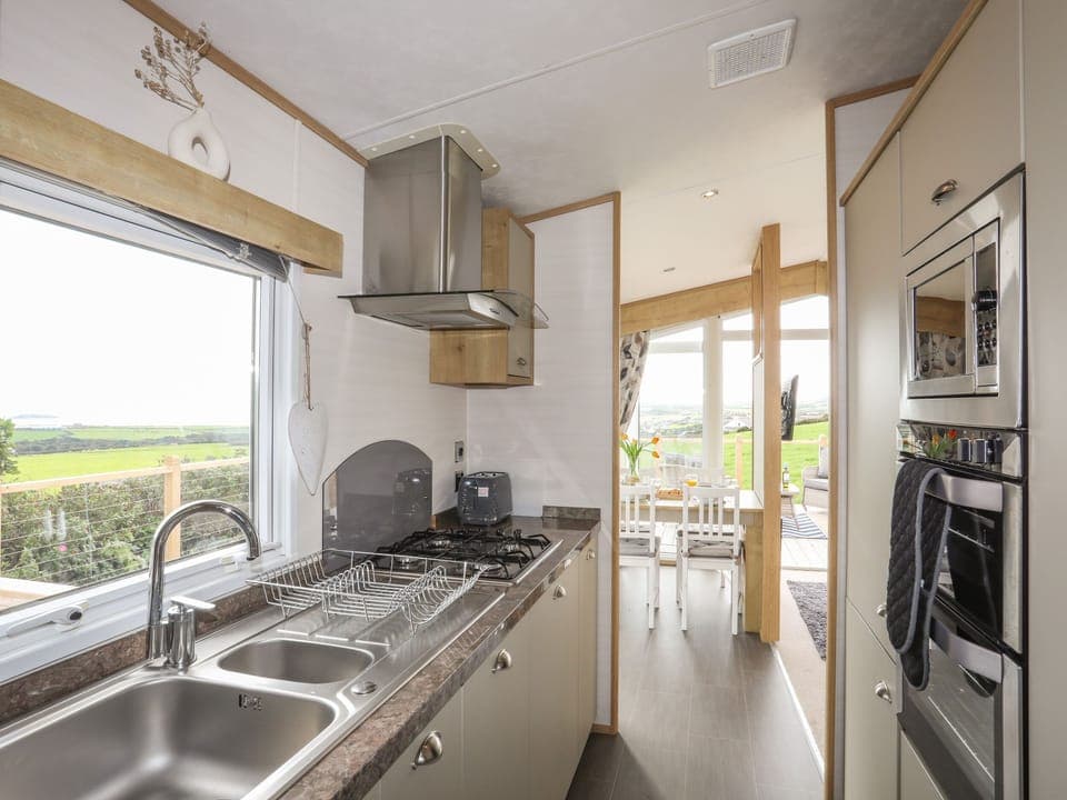 Fridge, electric kettle, toaster, cookware/dishes/utensils