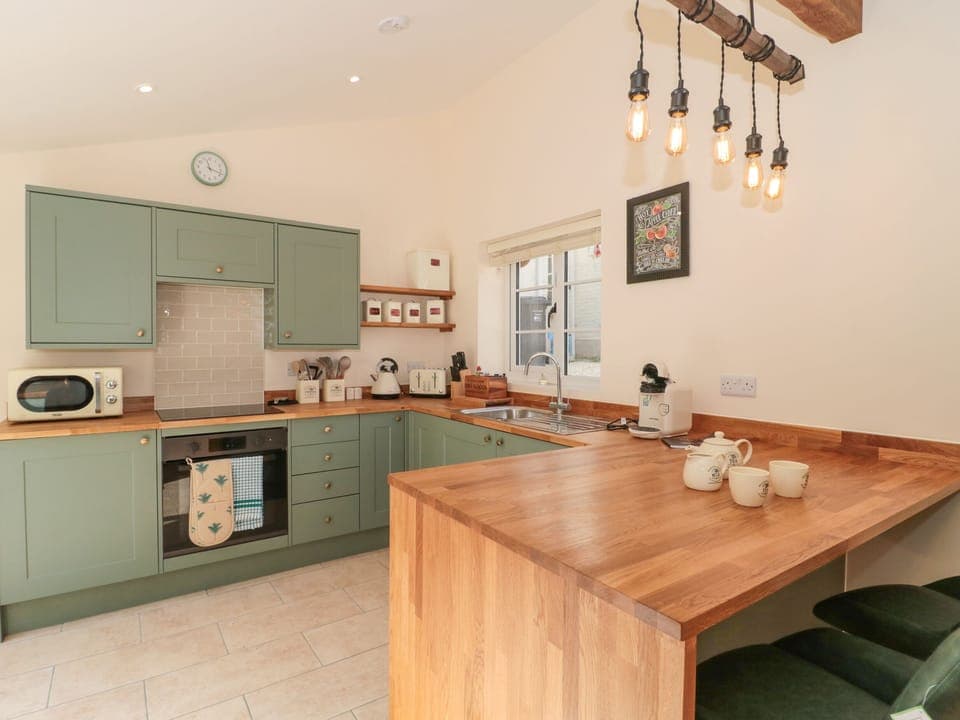 Fridge, electric kettle, toaster, cookware/dishes/utensils