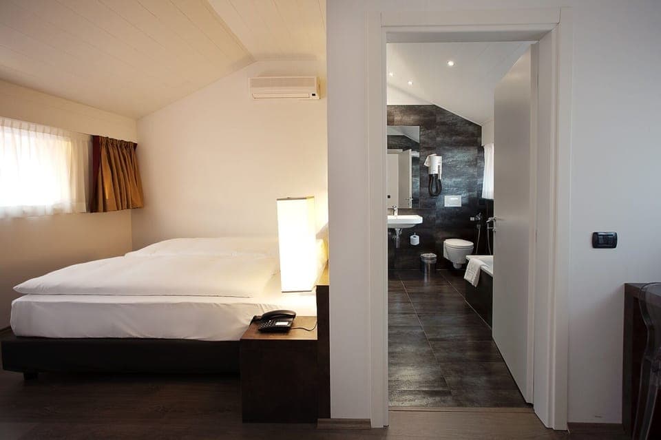 Suite | Hypo-allergenic bedding, in-room safe, desk, blackout drapes