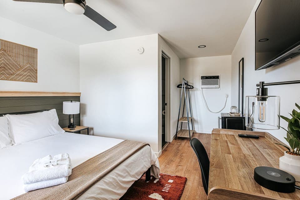 Comfort Room 1 Queen | Premium bedding, memory foam beds, desk, laptop workspace