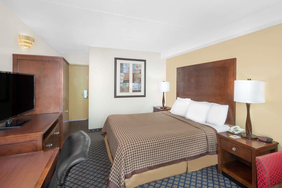 Room, 1 King Bed, Non Smoking | Desk, laptop workspace, blackout drapes, iron/ironing board