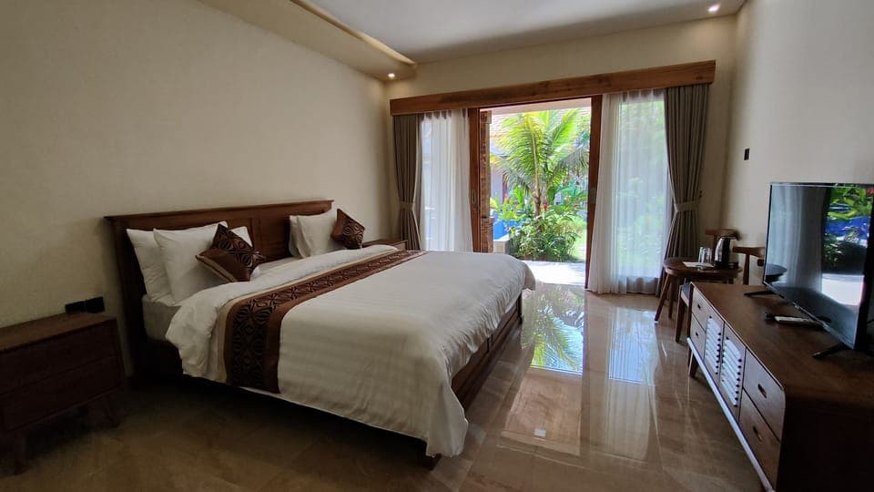 Deluxe Room | 10 bedrooms, premium bedding