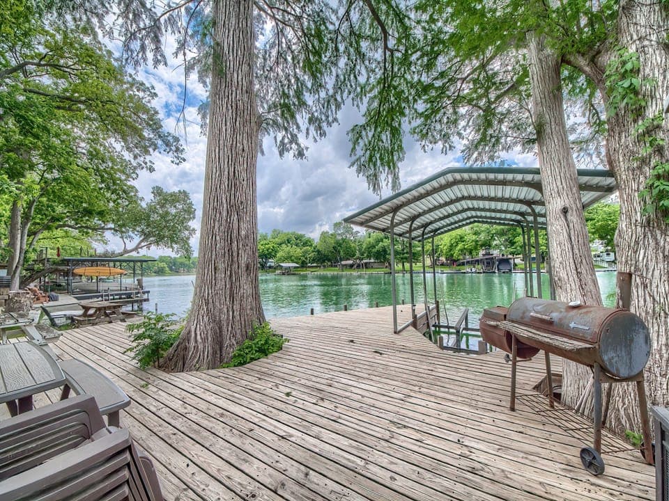 The lake is back!! This is the shared dock across the street, access is included as part of this rental