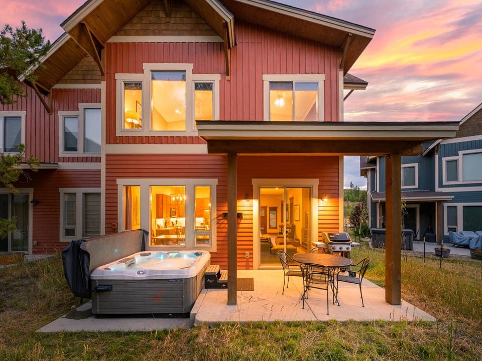 Unwind in your private hot tub surrounded by forest views and fresh mountain air - Covered patio includes a gas grill and dining table for al fresco meals anytime - Effortless indoor outdoor living just steps from the main living space