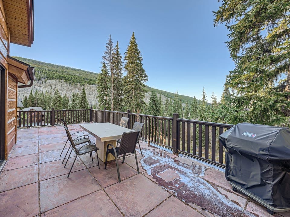 Main level deck with outdoor seating &amp; gas grill