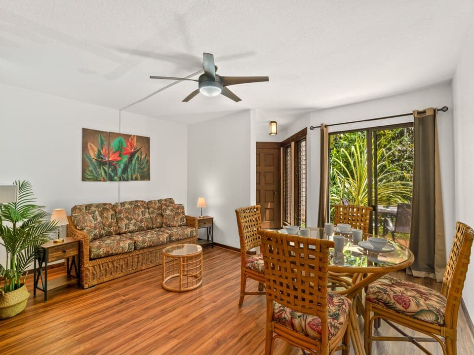 Welcoming main entry with a cozy seating area, perfect for dining and hosting.