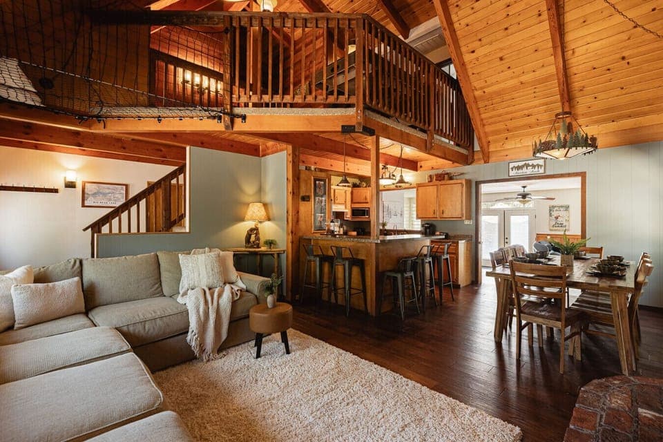 Huge open concept Knoll Lake Cabin with Dining and Living Room and Kitchen.